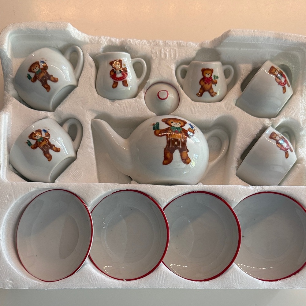 TWO identical Germany made porcelain child’s Tea Set